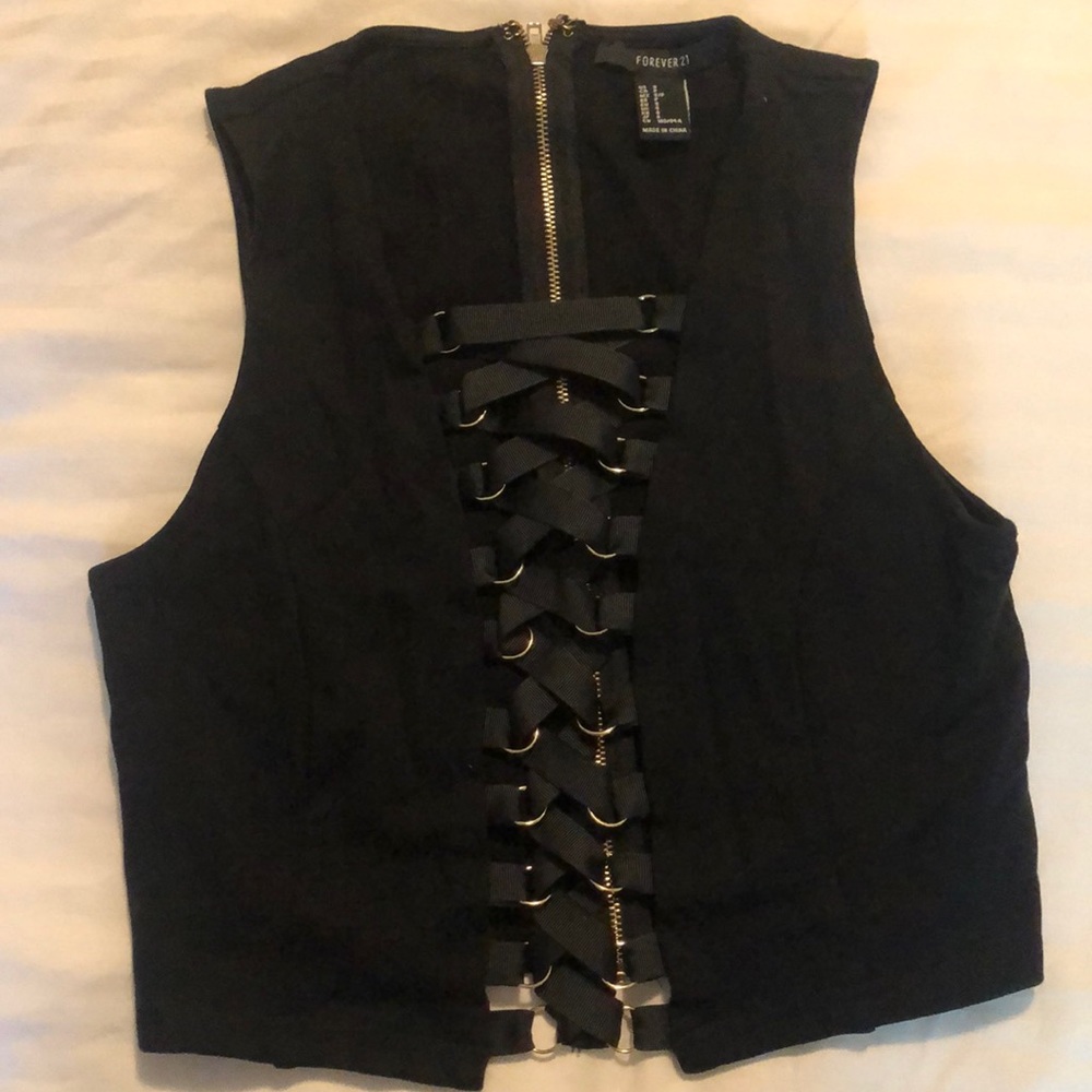 Black crop top with gold lace up hoops